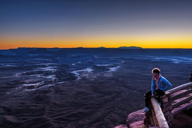 Boy at the green river overlook in canyonlands national park