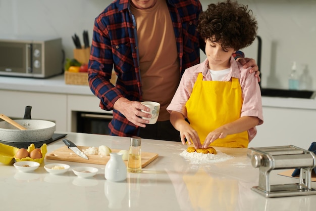 Boy Kneading Pasta Dough