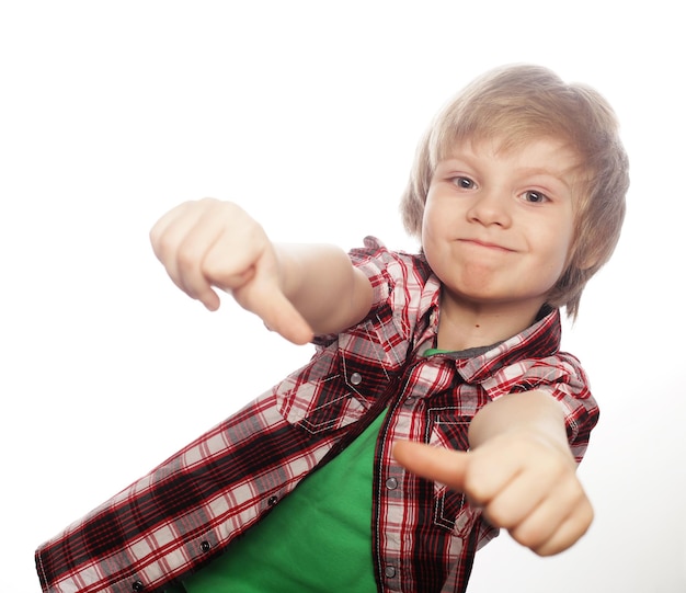 Boy raising hand and showing sign of okay