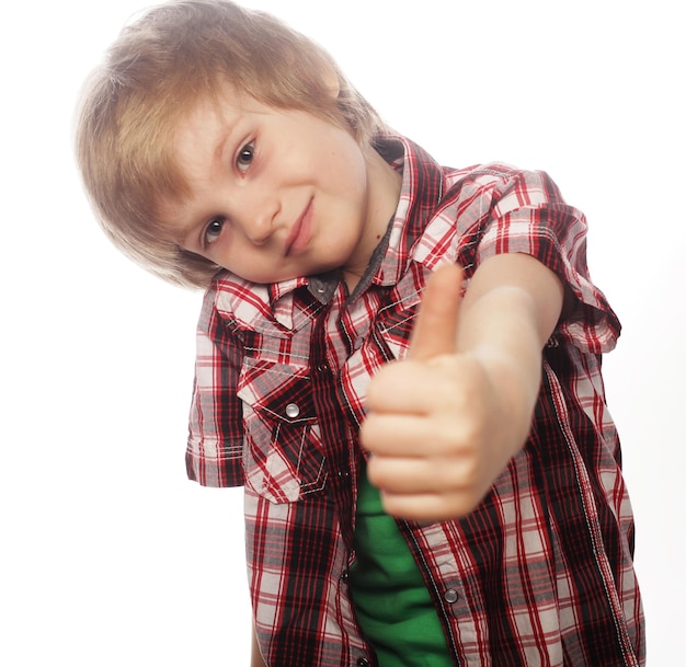 Boy raising hand and showing sign of okay