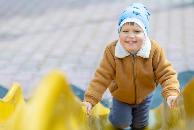 Boy riding downhill in autumn weather