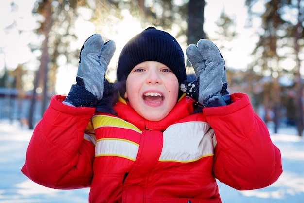 Boy in winter forest