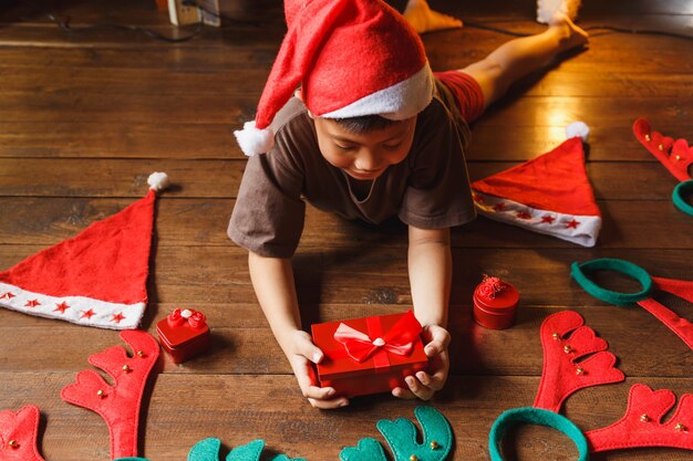 Boy with gift box on christmas day