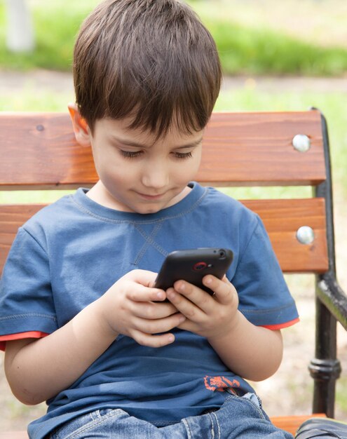 Photo boy with a mobile phone