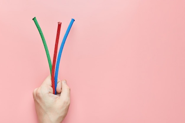 Braided nylon ropes in a hand