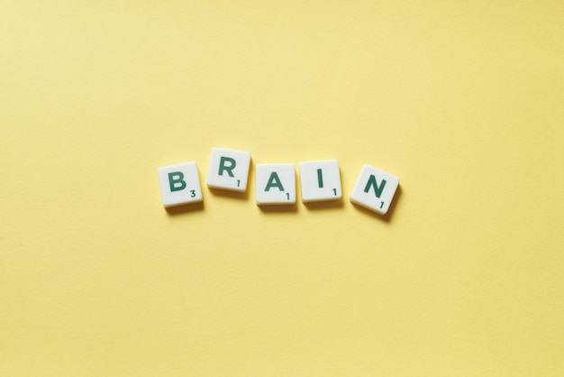 Brain formed of scrabble tiles