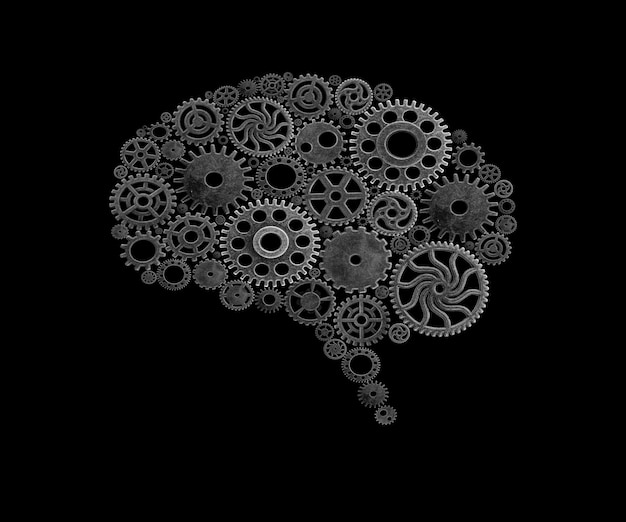 Photo a brain made of gears on a black background.