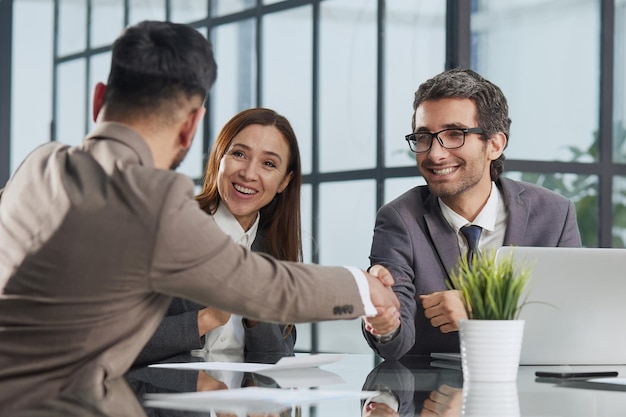 Brainstorming business meeting with diverse partners or clients at office