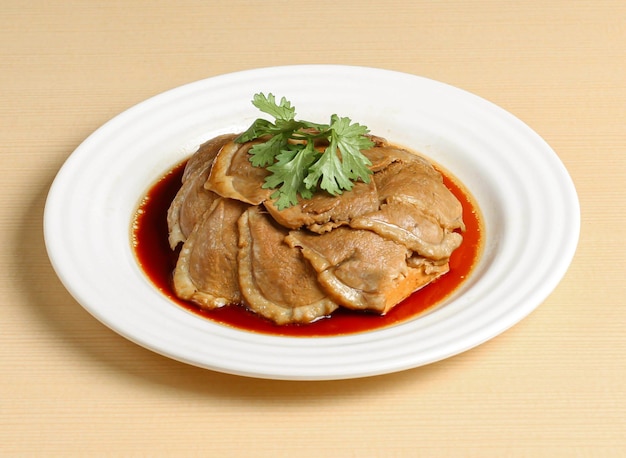 Braised duck and bean curd served in dish isolated on background top view singapore food