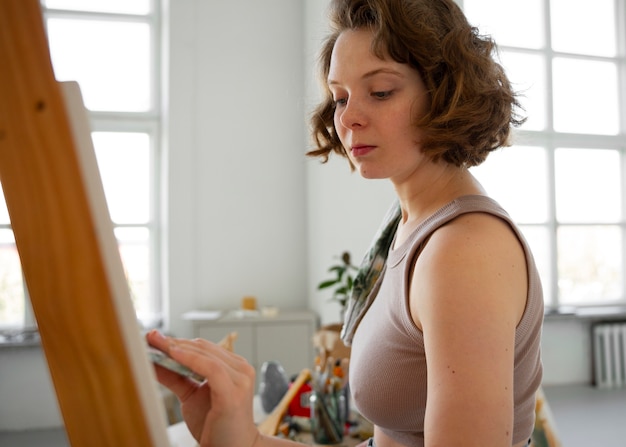 Braless woman working indoor