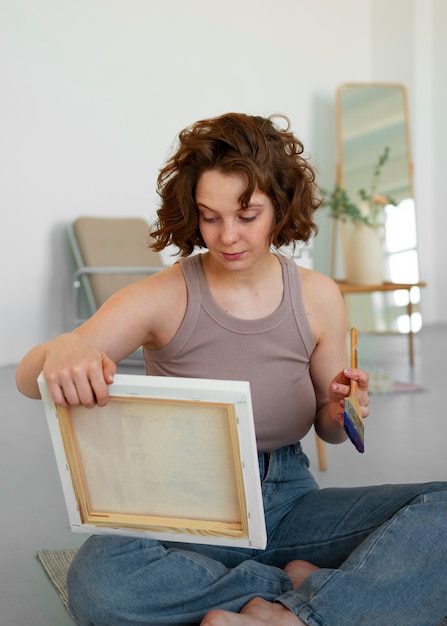 Braless woman working indoor