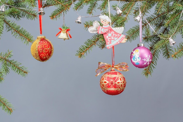 Branches of fir tree with Christmas ornament