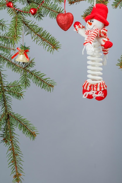 Branches of fir tree with Christmas ornament