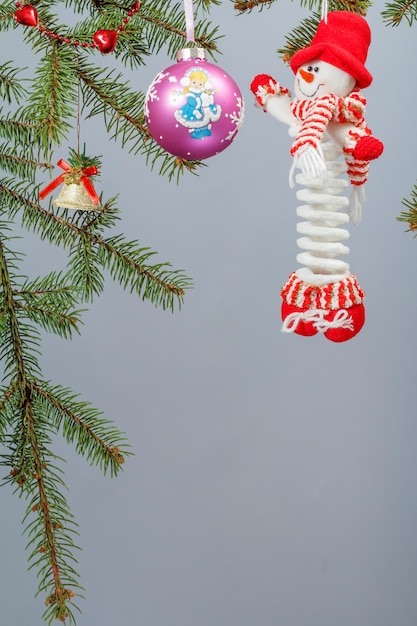 Branches of fir tree with Christmas ornament