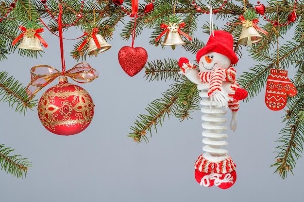 Branches of fir tree with Christmas ornament