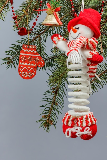 Branches of fir tree with Christmas ornament