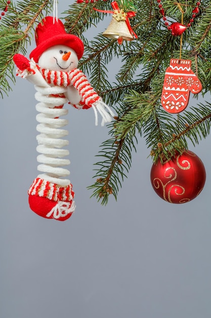 Branches of fir tree with Christmas ornament