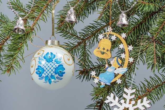 Branches of fir tree with Christmas ornament