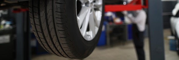 Brand new automobile tire changed part of vehicle in service centre