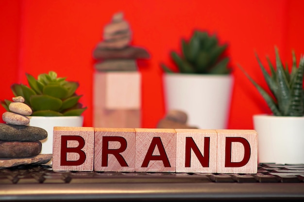 Photo brand word on red wooden cubes