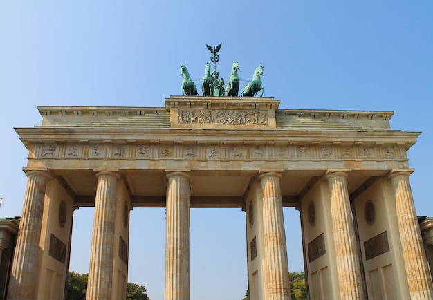 Brandenburg Gate in Berlin against the blue sky in summer