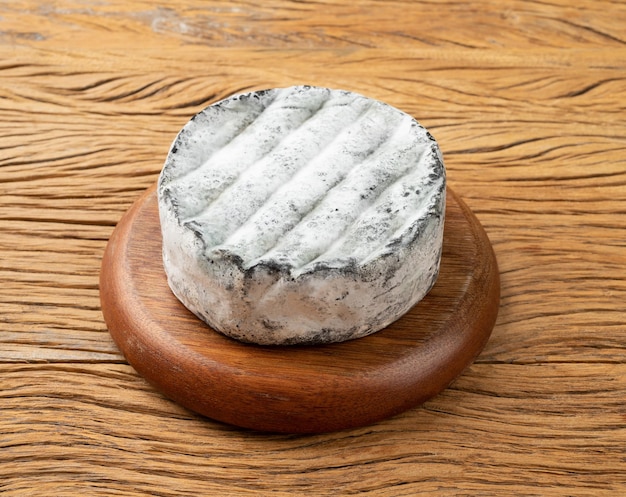 Brazilian artisan Lua Cheia cheese over wooden table