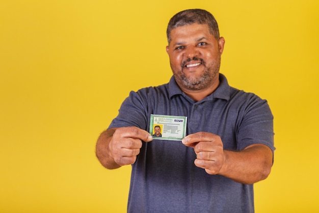 Brazilian black man adult with identity card RG Brazilian document