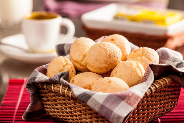 Brazilian cheese buns. Mesa de café da manha com pão de queijo