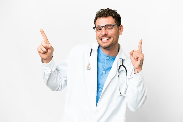 Brazilian doctor man over isolated white background pointing finger to the laterals and happy