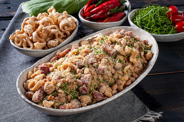 Brazilian Feijao tropeiro dish on the table