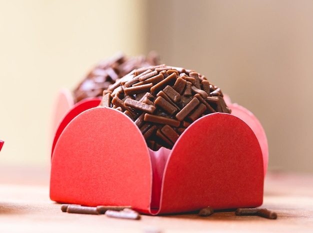 Brazilian gourmet brigadeiro in close-up photography. Brazilian food, dessert.