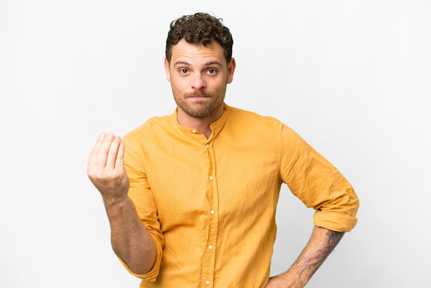 Brazilian man over isolated white background making Italian gesture