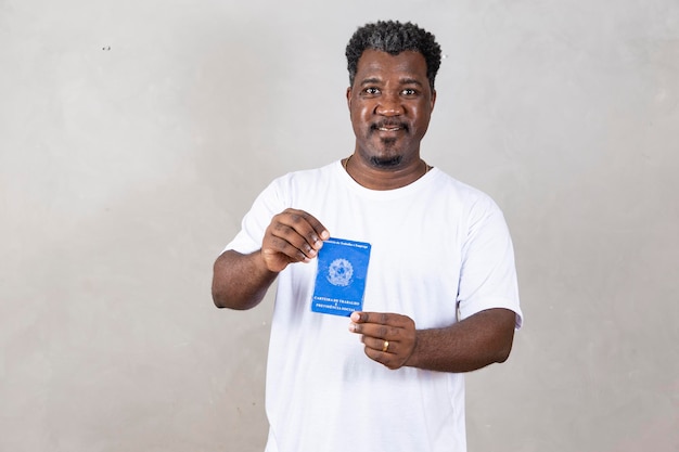 Brazilian man with document work and social security Carteira de Trabalho e Previdencia Social