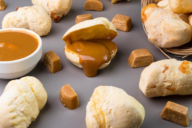 Brazilian Pao de queijo fresh cheese bread stuffed with dulce de leche Selective focus