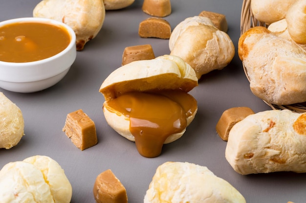 Brazilian Pao de queijo fresh cheese bread stuffed with dulce de leche Selective focus