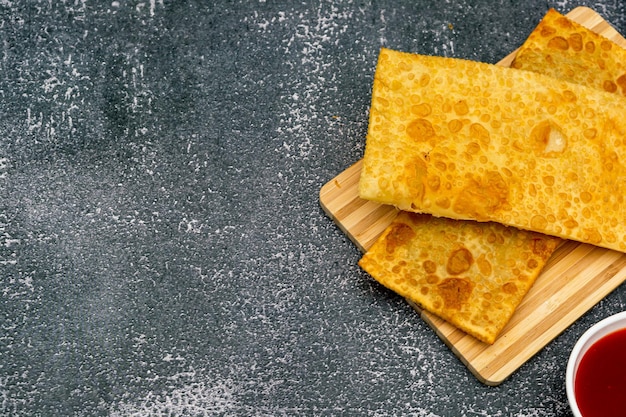 Brazilian pastel, fried snack traditional food with copy space