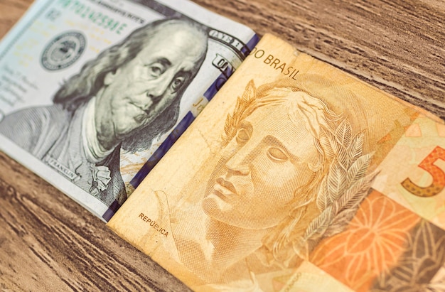 brazilian real banknotes and us dollar banknotes for foreign exchange market concept