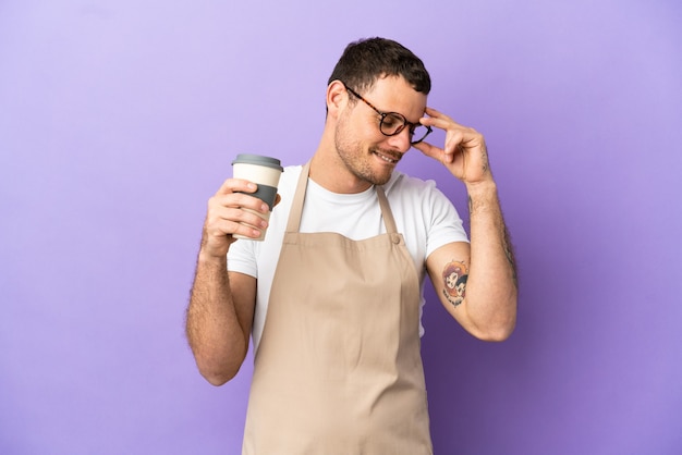 Brazilian restaurant waiter over isolated purple background laughing