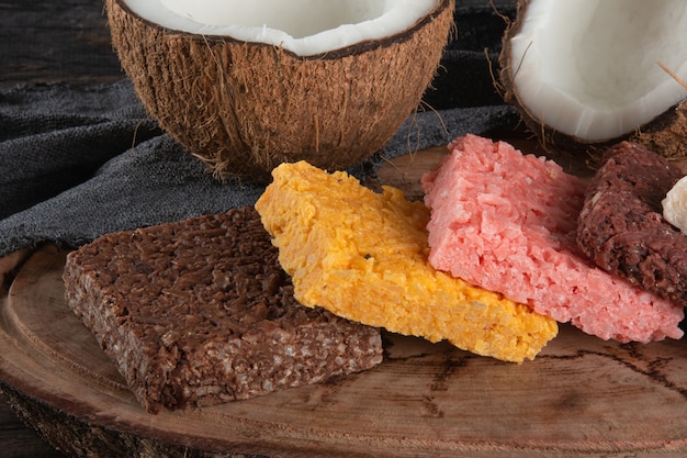 Brazilian sweet coconut candy on rustic wood