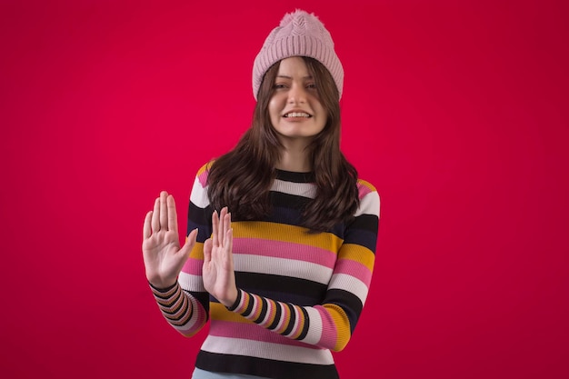 Brazilian teenager in studio wearing cool clothes and with various facial expressions