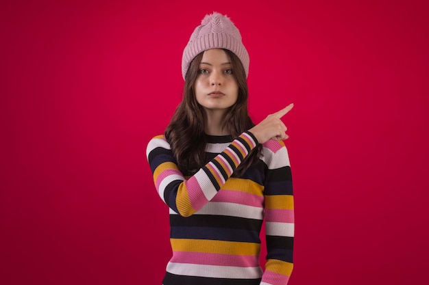 Brazilian teenager in studio wearing cool clothes and with various facial expressions