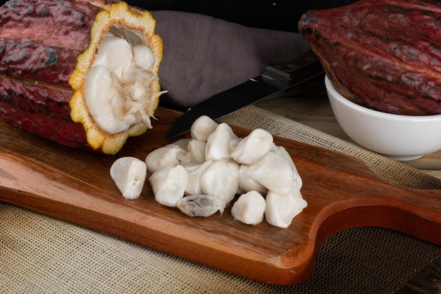 Brazilian traditional cocoa fruit on cutting board Selective focus