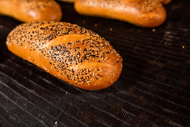 Bread. Bread production line. Bread on the conveyor.