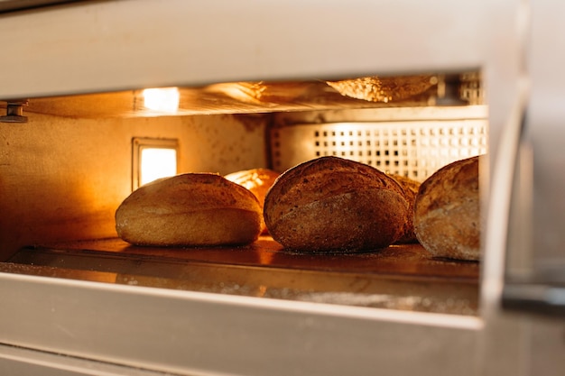 Bread is baked in the oven Bakery concept