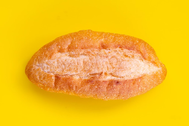 Bread isolated on yellow background