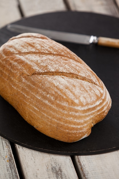 Bread loaf on cutting board