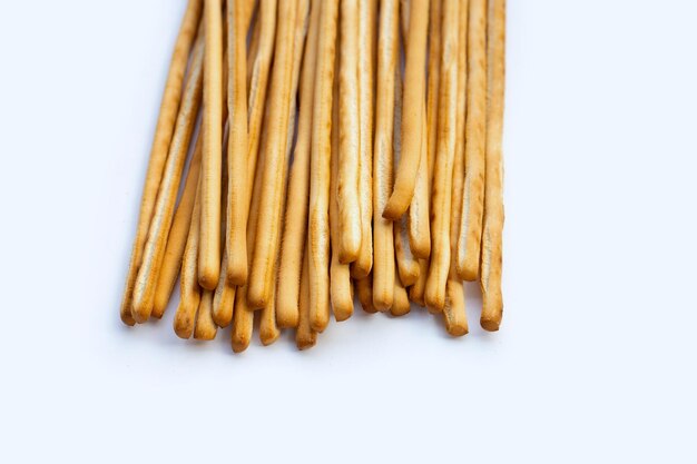 Photo bread sticks on white background