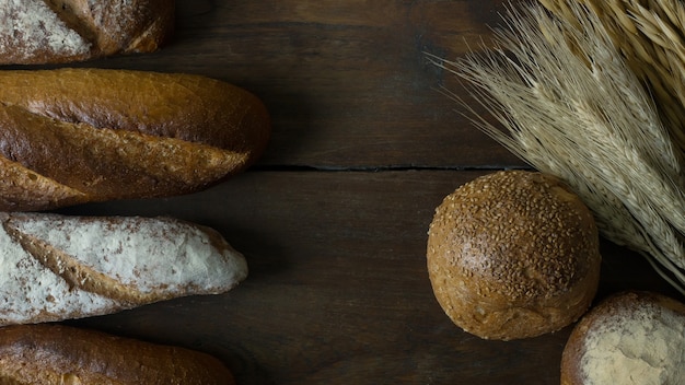 Bread Wheat oats on wood  image background.