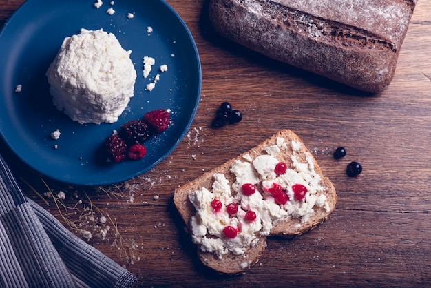 Bread with cheese and red berries