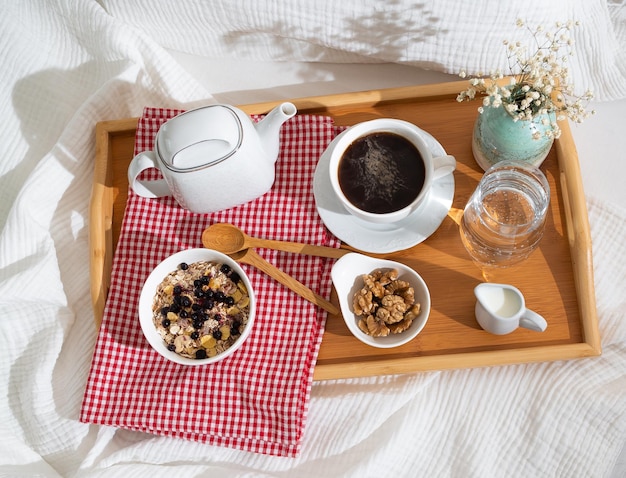 breakfast in bed in an early sunny morning